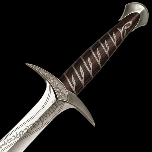 Close-up of Frodo Baggins Sting Sword Replica with engraved Elven design and polished stainless steel finish.