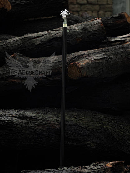 Detailed close-up of antique silver claw handle on handcrafted sword cane with hidden stainless blade and black metal shaft