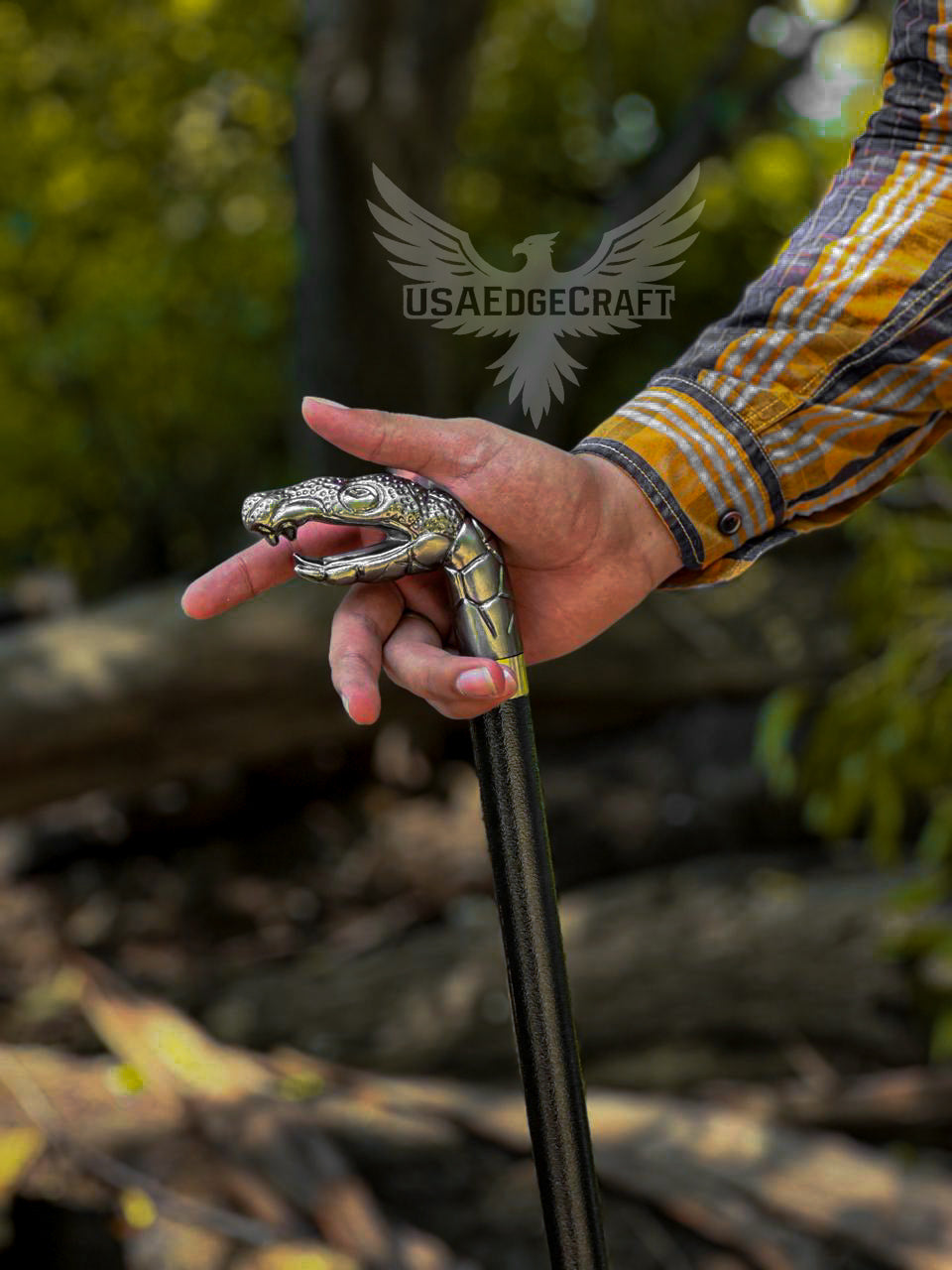 Hand-forged walking stick sword featuring a hidden stainless blade and black metal scabbard.