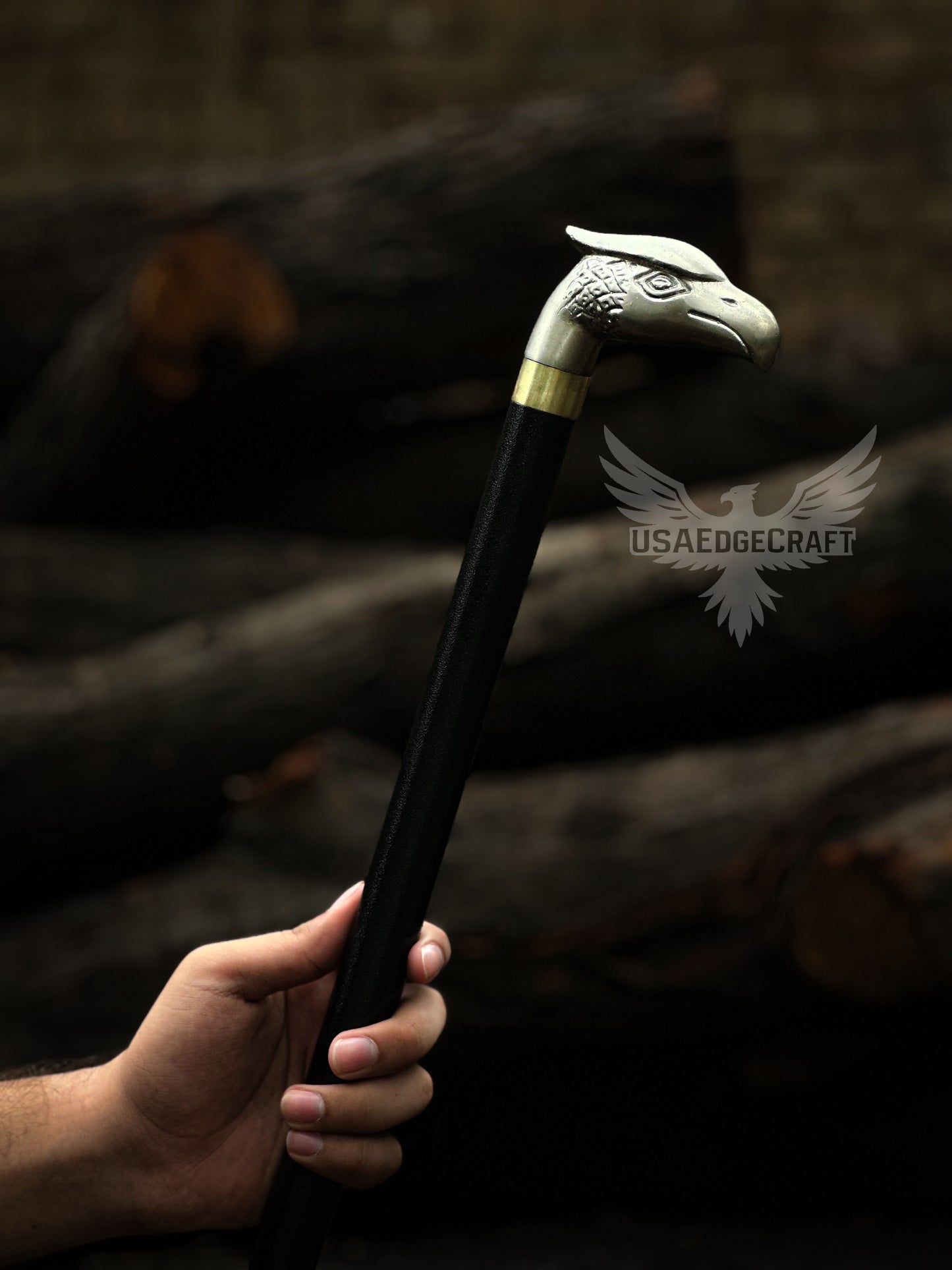 Functional high carbon steel walking cane with concealed blade and detailed eagle head design.