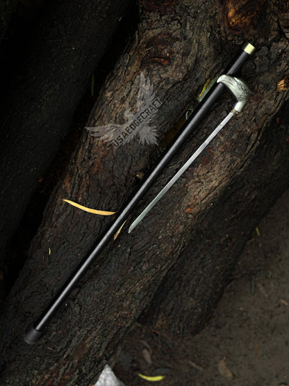 Close view of handcrafted eagle head hidden blade cane, featuring a high carbon steel sword and sleek black metal shaft for collectors.