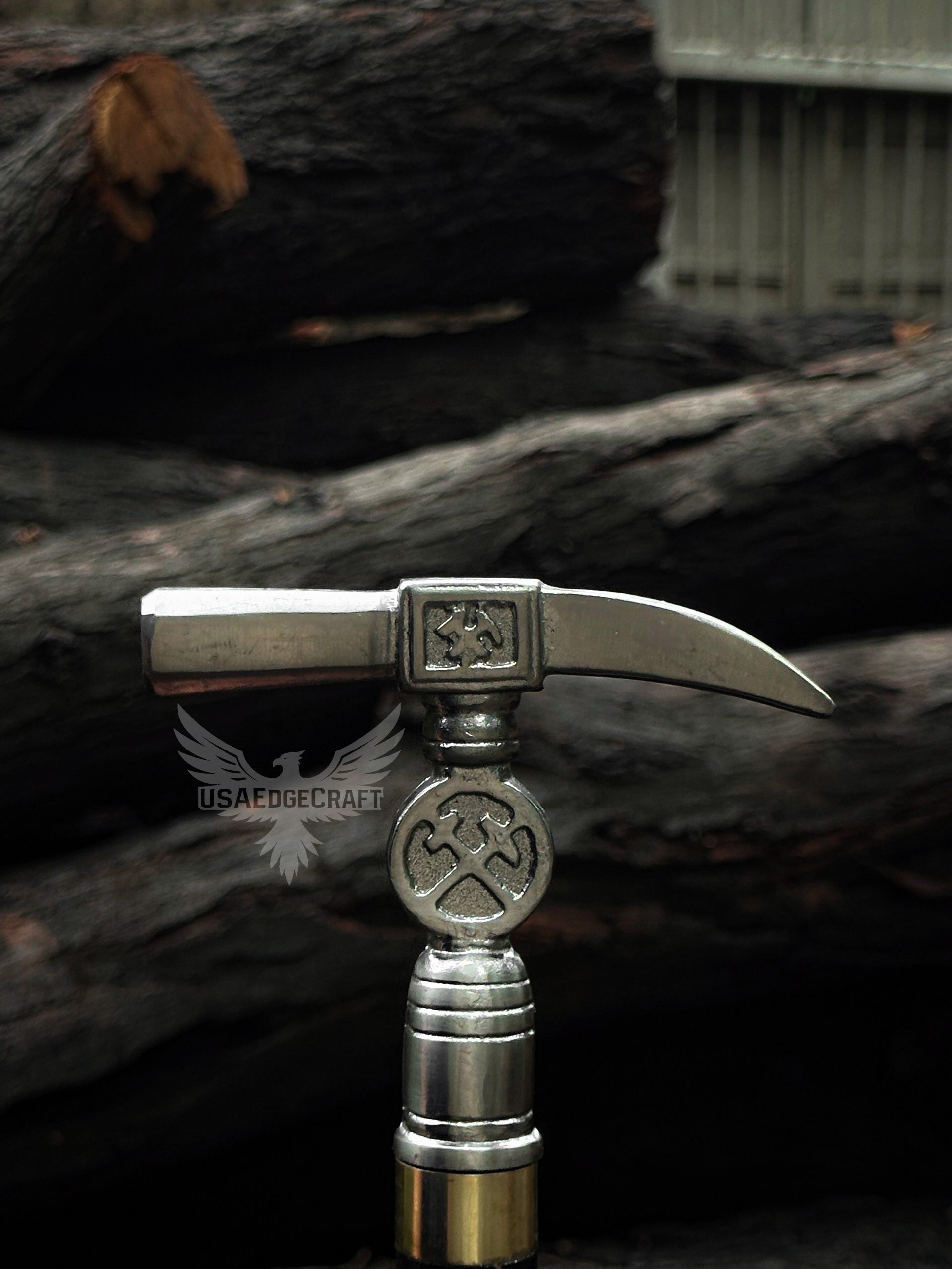 Complete view of full-length 37-inch hammer head sword cane featuring antique silver handle and sleek black metal scabbard design.