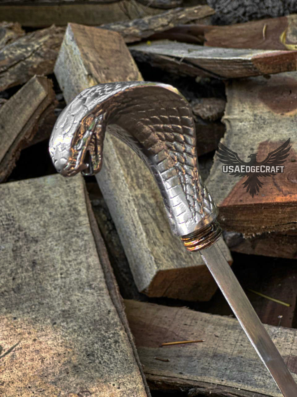 Functional sword cane featuring antique silver snake handle and black metal scabbard