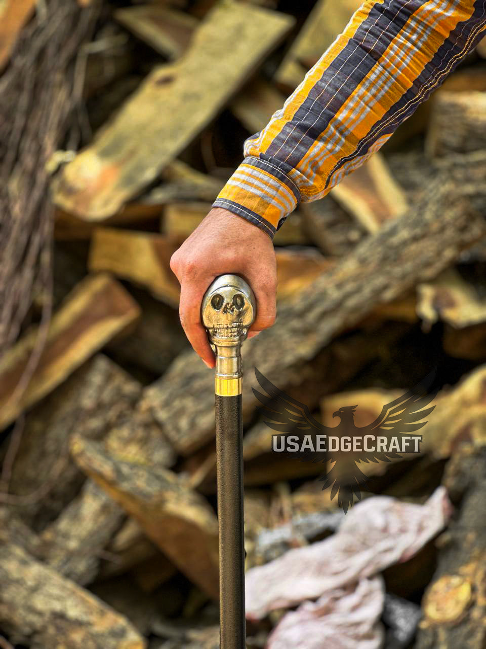 Close-up of antique silver skull handle on custom forged sword cane