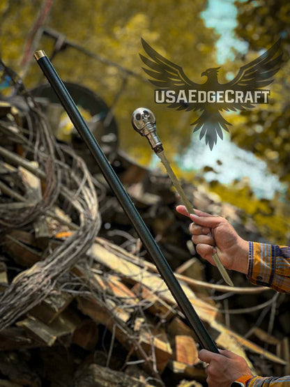 Skull face cane sword with black scabbard and detailed craftsmanship