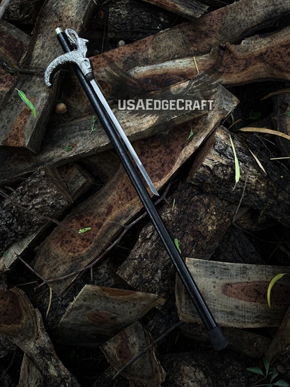 Close-up of stainless steel blade inside black metal walking cane