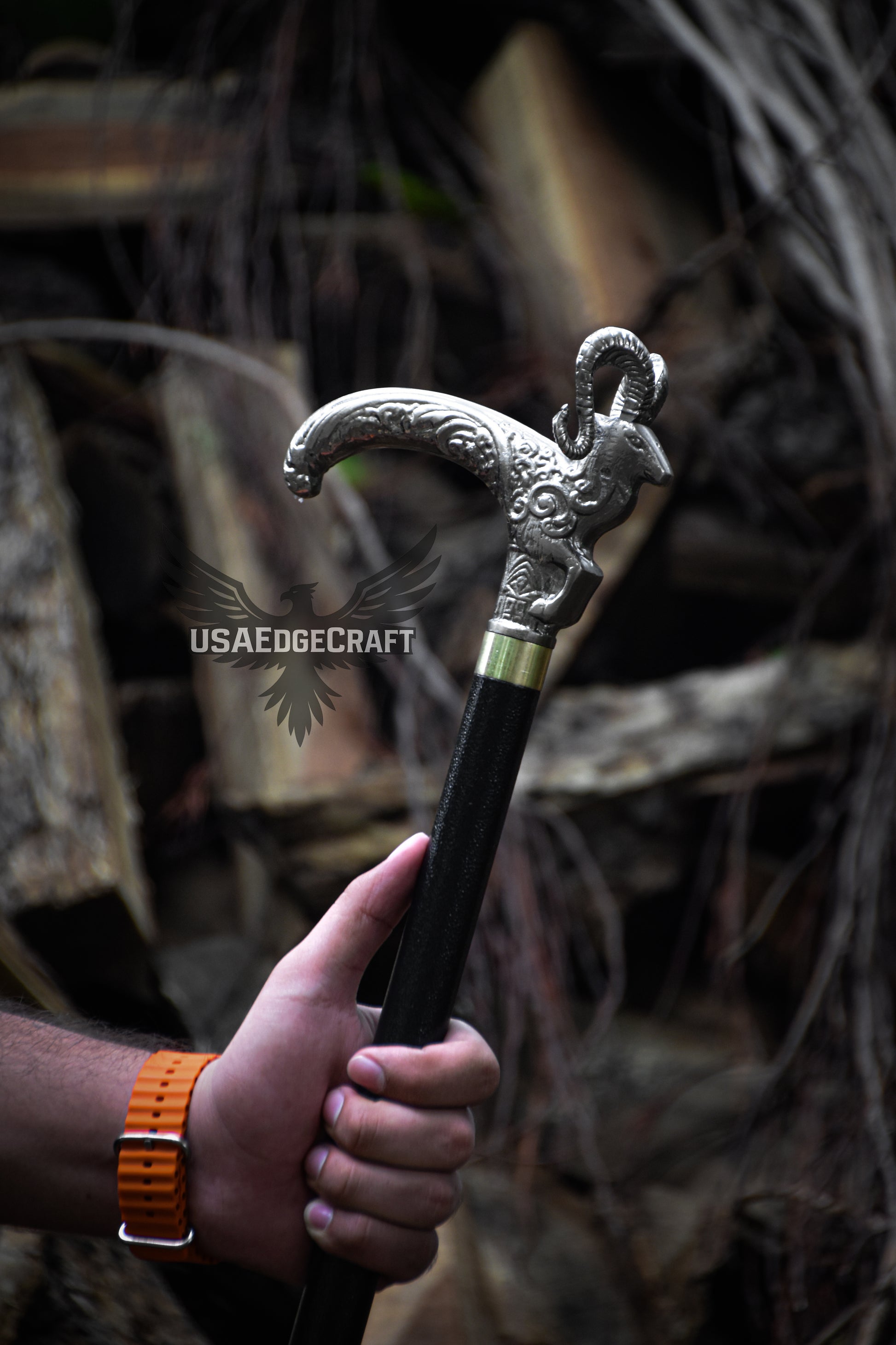 Luxury hand-forged Markhor head walking cane featuring concealed stainless steel sword blade for collectors and defense enthusiasts