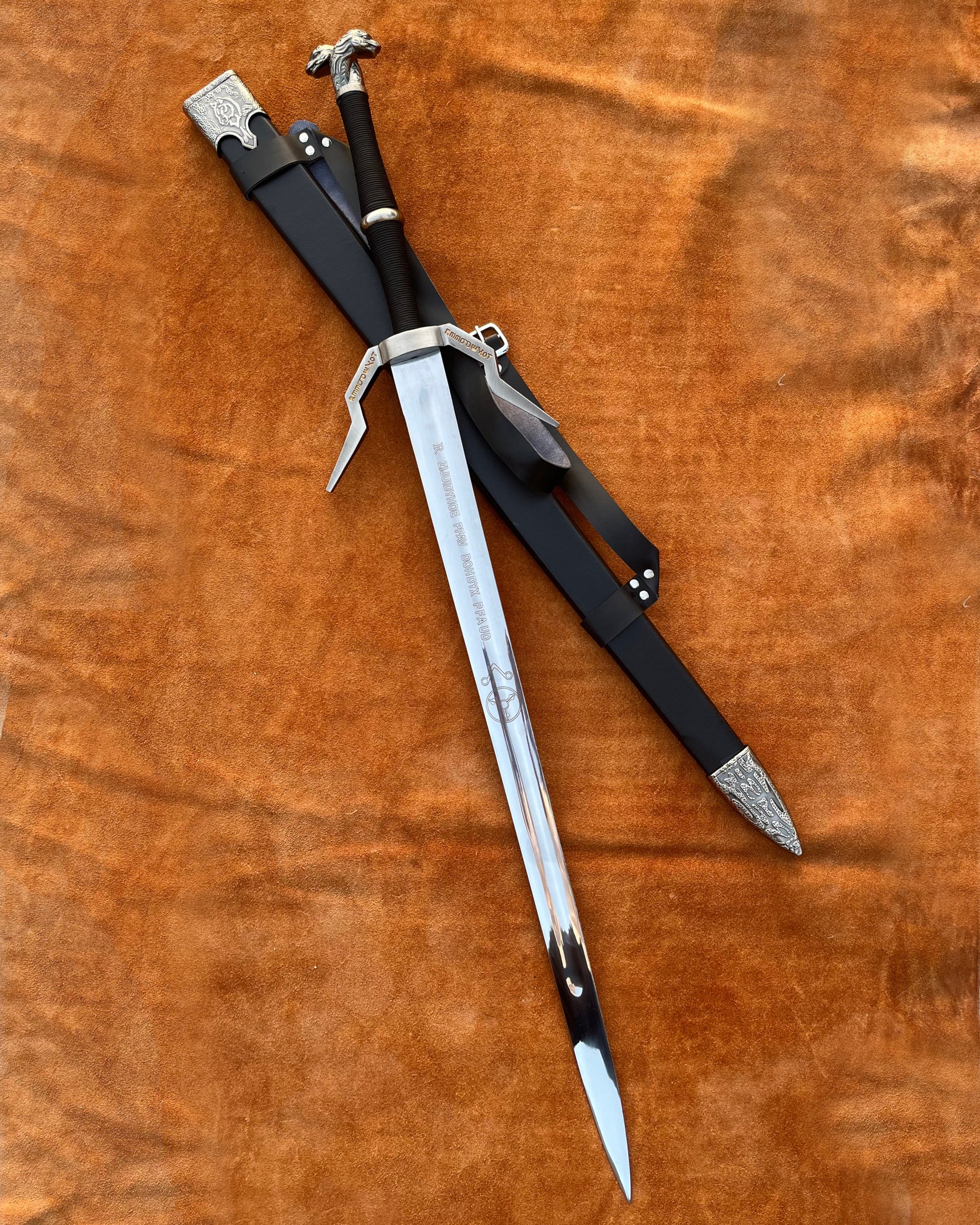 Collector-grade Witcher sword replica with detailed hilt, stainless steel blade, and premium leather-covered wooden scabbard