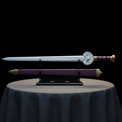 Close-up of Theoden Sword replica from Lord of the Rings, showcasing detailed hilt design and polished stainless steel blade.